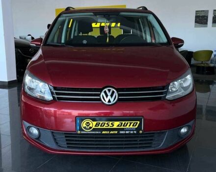 Красный Фольксваген Туран, объемом двигателя 1.6 л и пробегом 238 тыс. км за 9400 $, фото 1 на Automoto.ua