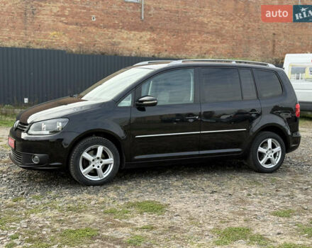 Красный Фольксваген Туран, объемом двигателя 1.6 л и пробегом 210 тыс. км за 10600 $, фото 5 на Automoto.ua