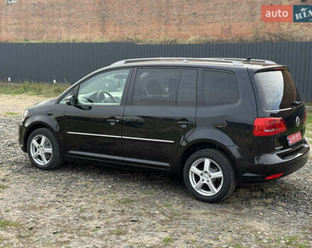 Красный Фольксваген Туран, объемом двигателя 1.6 л и пробегом 210 тыс. км за 10600 $, фото 11 на Automoto.ua