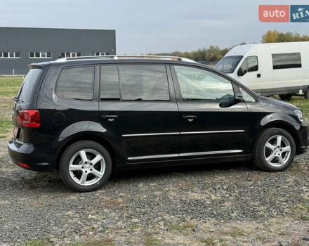 Красный Фольксваген Туран, объемом двигателя 1.6 л и пробегом 210 тыс. км за 10600 $, фото 7 на Automoto.ua