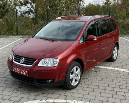 Красный Фольксваген Туран, объемом двигателя 2 л и пробегом 275 тыс. км за 6500 $, фото 2 на Automoto.ua