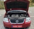 Красный Фольксваген Туран, объемом двигателя 2 л и пробегом 275 тыс. км за 6500 $, фото 9 на Automoto.ua