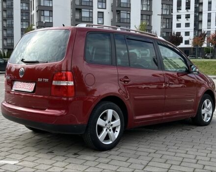 Красный Фольксваген Туран, объемом двигателя 2 л и пробегом 275 тыс. км за 6500 $, фото 8 на Automoto.ua