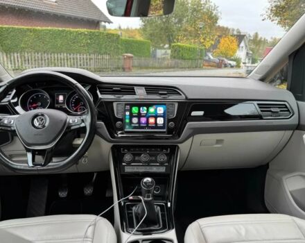 Красный Фольксваген Туран, объемом двигателя 1.4 л и пробегом 72 тыс. км за 9000 $, фото 6 на Automoto.ua