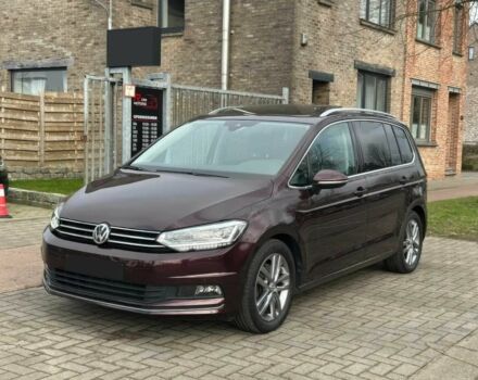 Красный Фольксваген Туран, объемом двигателя 1.5 л и пробегом 35 тыс. км за 9800 $, фото 1 на Automoto.ua