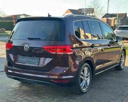 Красный Фольксваген Туран, объемом двигателя 1.5 л и пробегом 35 тыс. км за 9800 $, фото 3 на Automoto.ua