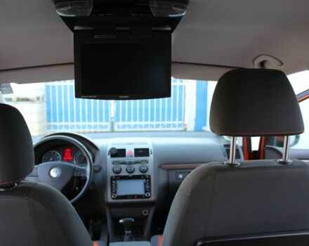 Красный Фольксваген Туран, объемом двигателя 1.4 л и пробегом 220 тыс. км за 8000 $, фото 5 на Automoto.ua