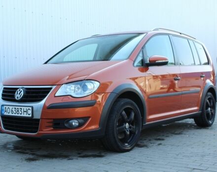 Красный Фольксваген Туран, объемом двигателя 1.4 л и пробегом 220 тыс. км за 8000 $, фото 2 на Automoto.ua