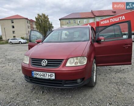 Красный Фольксваген Туран, объемом двигателя 1.97 л и пробегом 387 тыс. км за 4900 $, фото 1 на Automoto.ua