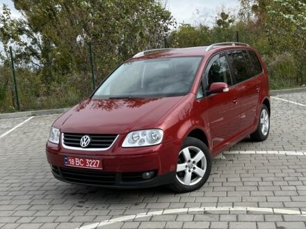 Фольксваген Туран 2005 в Луцке на Automoto.ua Красный Фольксваген Туран, объемом двигателя 2 л и пробегом 275 тыс. км за 6500 $, фото 1 на Automoto.ua