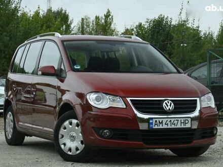 Красный Фольксваген Туран, объемом двигателя 1.4 л и пробегом 193 тыс. км за 6500 $, фото 1 на Automoto.ua