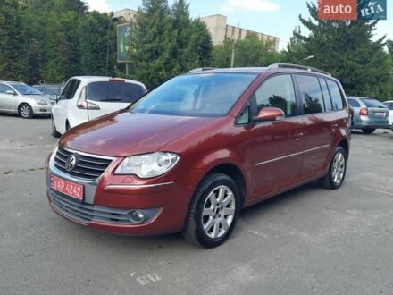 Фольксваген Туран 2007 в Хмельницком на Automoto.ua Красный Фольксваген Туран, объемом двигателя 1.4 л и пробегом 254 тыс. км за 6999 $, фото 1 на Automoto.ua
