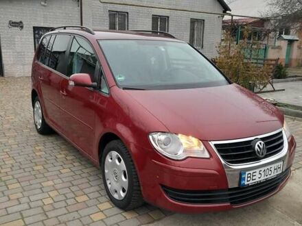 Червоний Фольксваген Туран, об'ємом двигуна 1.9 л та пробігом 315 тис. км за 6900 $, фото 1 на Automoto.ua