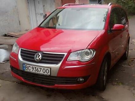 Фольксваген Туран 2009 в Львове на Automoto.ua Красный Фольксваген Туран, объемом двигателя 1.39 л и пробегом 250 тыс. км за 6500 $, фото 1 на Automoto.ua