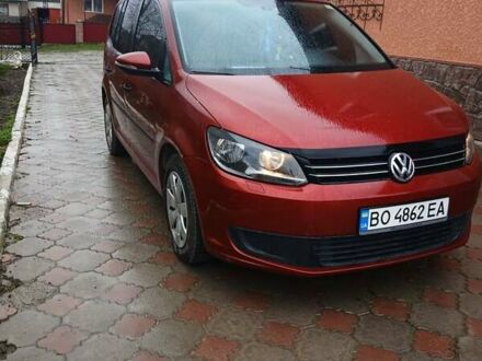 Красный Фольксваген Туран, объемом двигателя 1.6 л и пробегом 230 тыс. км за 10200 $, фото 1 на Automoto.ua