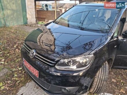 Красный Фольксваген Туран, объемом двигателя 1.6 л и пробегом 220 тыс. км за 12000 $, фото 1 на Automoto.ua