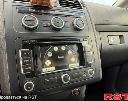 Фольксваген Туран 2013 в Вознесенске на Automoto.ua Фольксваген Туран, объемом двигателя 2 л и пробегом 179 тыс. км за 14500 $, фото 10 на Automoto.ua