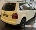 Жовтий Фольксваген Туран, об'ємом двигуна 1.4 л та пробігом 252 тис. км за 6600 $, фото 6 на Automoto.ua