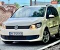 Желтый Фольксваген Туран, объемом двигателя 1.39 л и пробегом 245 тыс. км за 5999 $, фото 1 на Automoto.ua