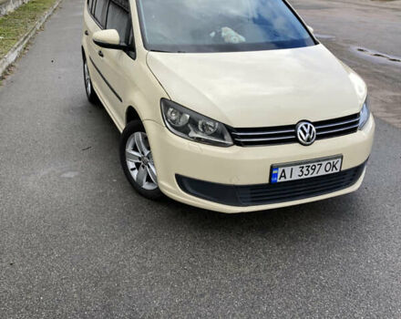 Желтый Фольксваген Туран, объемом двигателя 1.39 л и пробегом 200 тыс. км за 10000 $, фото 2 на Automoto.ua