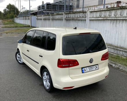 Желтый Фольксваген Туран, объемом двигателя 1.39 л и пробегом 200 тыс. км за 10000 $, фото 1 на Automoto.ua