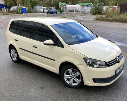 Желтый Фольксваген Туран, объемом двигателя 1.39 л и пробегом 200 тыс. км за 10000 $, фото 3 на Automoto.ua