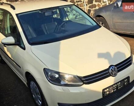 Желтый Фольксваген Туран, объемом двигателя 2 л и пробегом 340 тыс. км за 9999 $, фото 4 на Automoto.ua