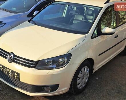 Желтый Фольксваген Туран, объемом двигателя 2 л и пробегом 340 тыс. км за 9999 $, фото 3 на Automoto.ua