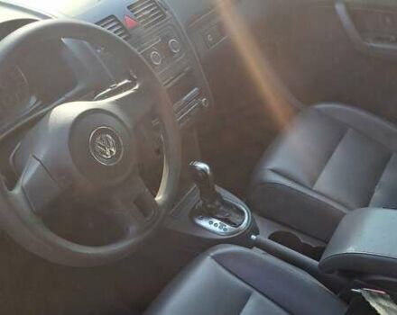Желтый Фольксваген Туран, объемом двигателя 2 л и пробегом 340 тыс. км за 9999 $, фото 2 на Automoto.ua