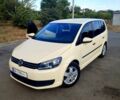 Жовтий Фольксваген Туран, об'ємом двигуна 2 л та пробігом 223 тис. км за 10000 $, фото 1 на Automoto.ua
