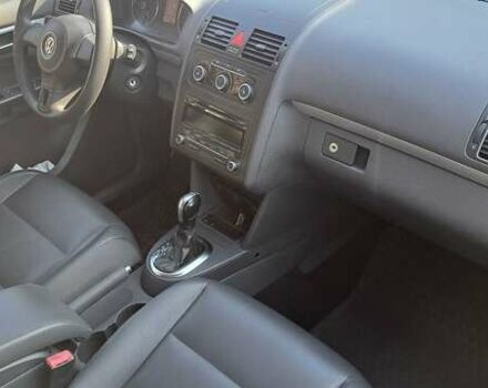 Желтый Фольксваген Туран, объемом двигателя 2 л и пробегом 340 тыс. км за 9999 $, фото 1 на Automoto.ua