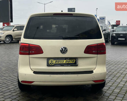 Желтый Фольксваген Туран, объемом двигателя 1.97 л и пробегом 213 тыс. км за 8990 $, фото 5 на Automoto.ua
