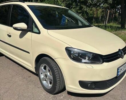 Желтый Фольксваген Туран, объемом двигателя 1.97 л и пробегом 336 тыс. км за 9599 $, фото 1 на Automoto.ua