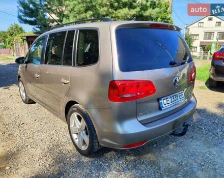 Желтый Фольксваген Туран, объемом двигателя 2 л и пробегом 214 тыс. км за 12500 $, фото 3 на Automoto.ua
