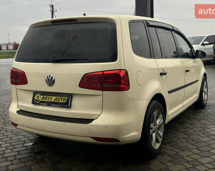 Желтый Фольксваген Туран, объемом двигателя 1.97 л и пробегом 213 тыс. км за 8990 $, фото 6 на Automoto.ua