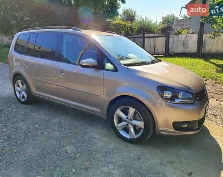 Желтый Фольксваген Туран, объемом двигателя 2 л и пробегом 214 тыс. км за 12500 $, фото 5 на Automoto.ua