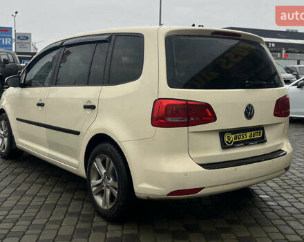 Желтый Фольксваген Туран, объемом двигателя 1.97 л и пробегом 213 тыс. км за 8990 $, фото 4 на Automoto.ua