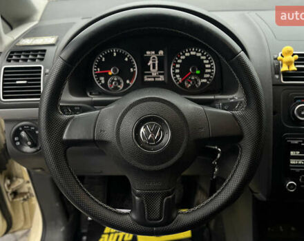 Желтый Фольксваген Туран, объемом двигателя 1.97 л и пробегом 213 тыс. км за 8990 $, фото 9 на Automoto.ua