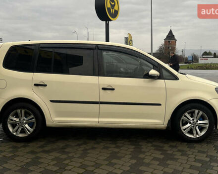 Желтый Фольксваген Туран, объемом двигателя 1.97 л и пробегом 213 тыс. км за 8990 $, фото 7 на Automoto.ua