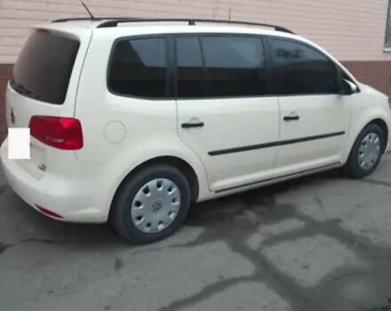 Желтый Фольксваген Туран, объемом двигателя 2 л и пробегом 320 тыс. км за 12500 $, фото 5 на Automoto.ua