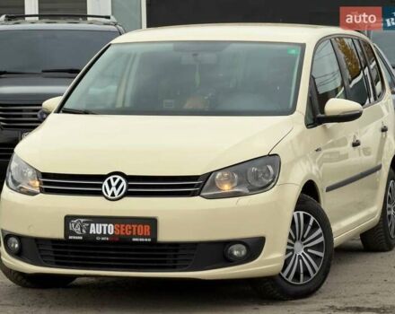 Желтый Фольксваген Туран, объемом двигателя 2 л и пробегом 262 тыс. км за 10800 $, фото 1 на Automoto.ua