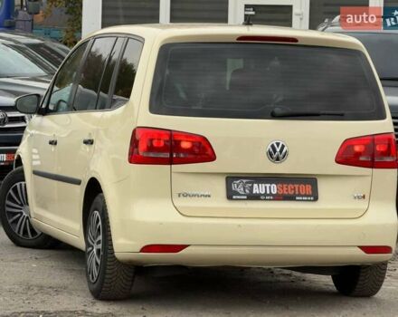 Желтый Фольксваген Туран, объемом двигателя 2 л и пробегом 262 тыс. км за 10800 $, фото 9 на Automoto.ua