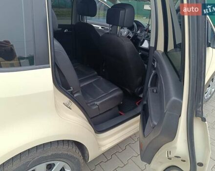 Желтый Фольксваген Туран, объемом двигателя 2 л и пробегом 300 тыс. км за 7899 $, фото 11 на Automoto.ua