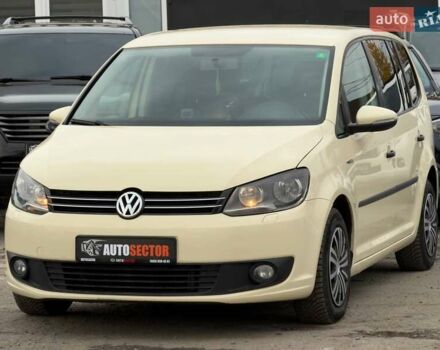 Желтый Фольксваген Туран, объемом двигателя 2 л и пробегом 262 тыс. км за 10800 $, фото 2 на Automoto.ua