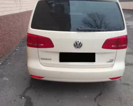 Желтый Фольксваген Туран, объемом двигателя 2 л и пробегом 320 тыс. км за 12500 $, фото 8 на Automoto.ua