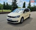Жовтий Фольксваген Туран, об'ємом двигуна 1.97 л та пробігом 200 тис. км за 6500 $, фото 1 на Automoto.ua