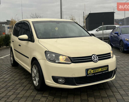 Желтый Фольксваген Туран, объемом двигателя 1.97 л и пробегом 213 тыс. км за 8990 $, фото 1 на Automoto.ua