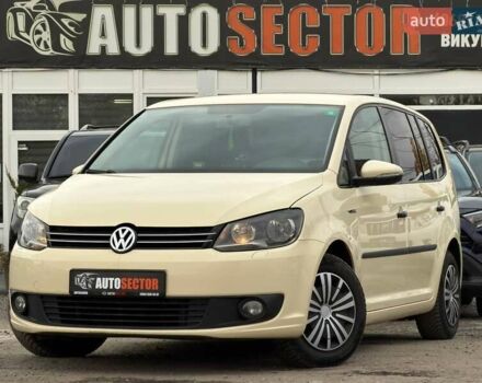 Жовтий Фольксваген Туран, об'ємом двигуна 2 л та пробігом 262 тис. км за 10800 $, фото 1 на Automoto.ua