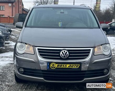 Серый Фольксваген Туран, объемом двигателя 1.4 л и пробегом 242 тыс. км за 7950 $, фото 1 на Automoto.ua