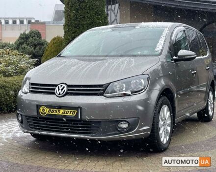 Серый Фольксваген Туран, объемом двигателя 1.4 л и пробегом 182 тыс. км за 9900 $, фото 2 на Automoto.ua